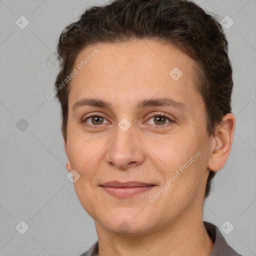 Joyful white adult female with short  brown hair and brown eyes