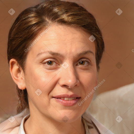 Joyful white adult female with medium  brown hair and brown eyes