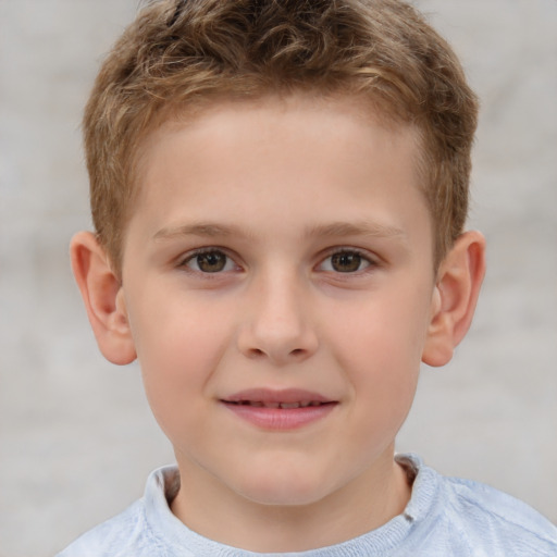 Joyful white child male with short  brown hair and brown eyes