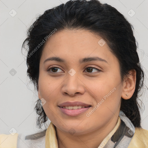 Joyful latino young-adult female with medium  brown hair and brown eyes