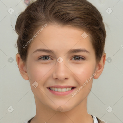 Joyful white child female with short  brown hair and brown eyes