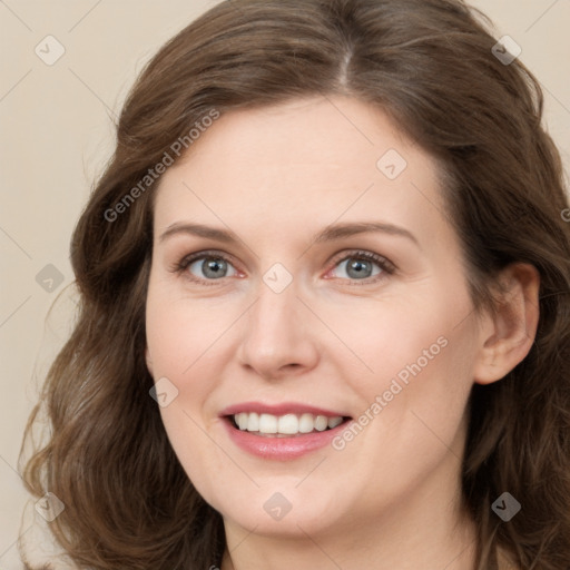 Joyful white young-adult female with medium  brown hair and green eyes