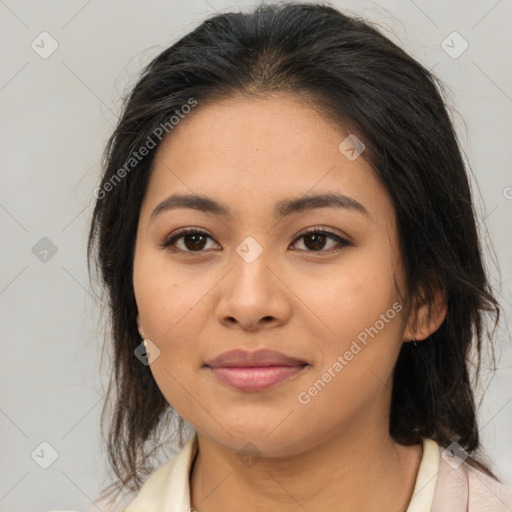 Joyful asian young-adult female with medium  brown hair and brown eyes