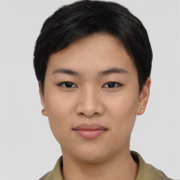 Joyful asian young-adult female with short  black hair and brown eyes