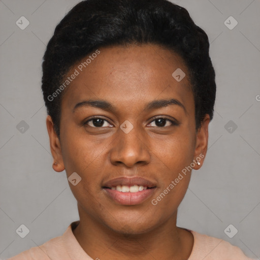 Joyful black young-adult female with short  black hair and brown eyes