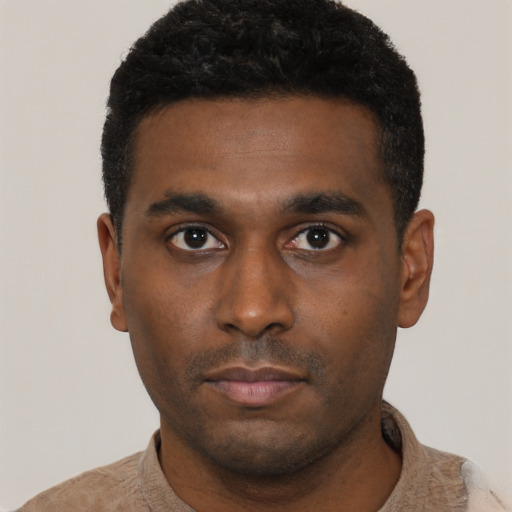 Neutral black young-adult male with short  black hair and brown eyes