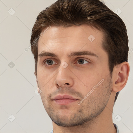 Neutral white young-adult male with short  brown hair and brown eyes