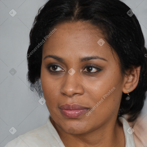 Joyful black young-adult female with medium  brown hair and brown eyes