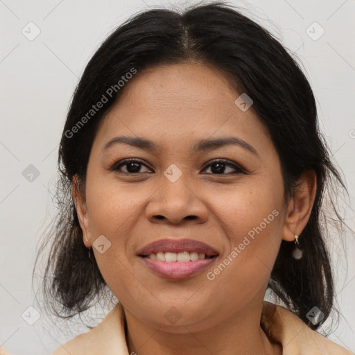 Joyful asian adult female with medium  brown hair and brown eyes