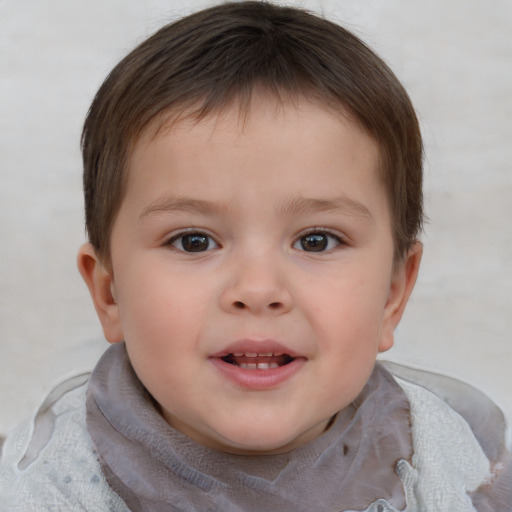 Joyful white child male with short  brown hair and brown eyes