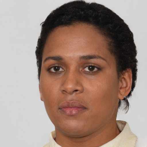 Neutral black young-adult female with short  black hair and brown eyes
