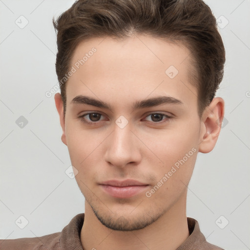 Neutral white young-adult male with short  brown hair and brown eyes