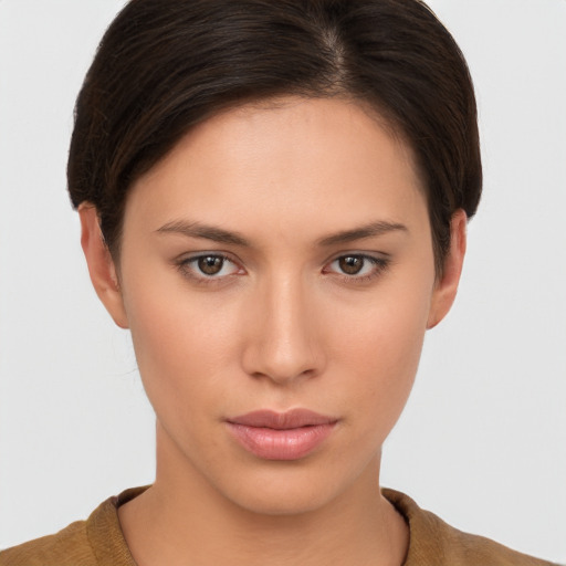 Neutral white young-adult female with short  brown hair and brown eyes