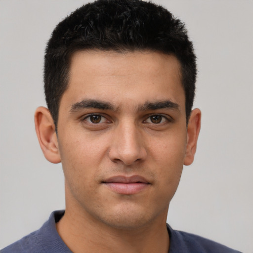 Neutral white young-adult male with short  black hair and brown eyes
