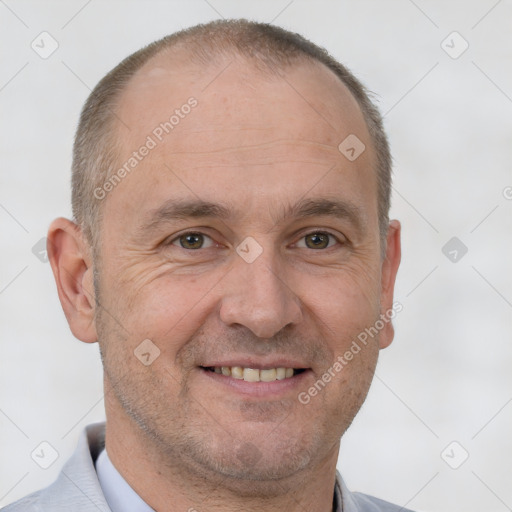 Joyful white adult male with short  brown hair and brown eyes