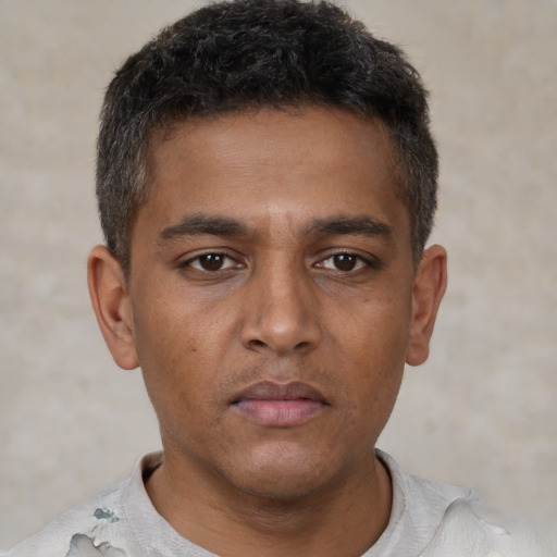 Neutral black young-adult male with short  brown hair and brown eyes