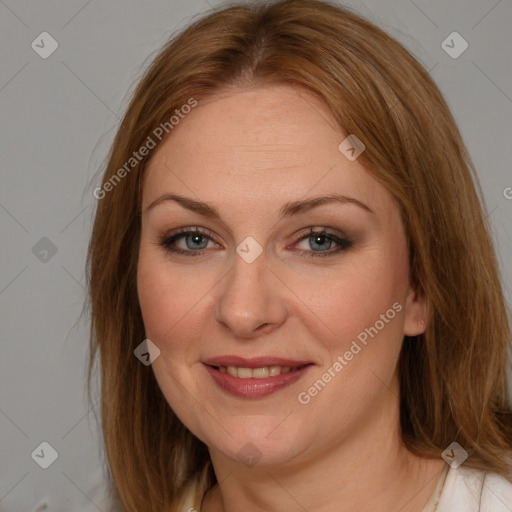 Joyful white adult female with medium  brown hair and blue eyes