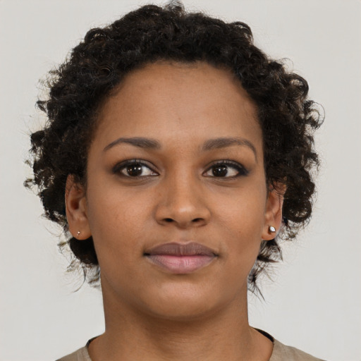 Neutral black young-adult female with short  brown hair and brown eyes