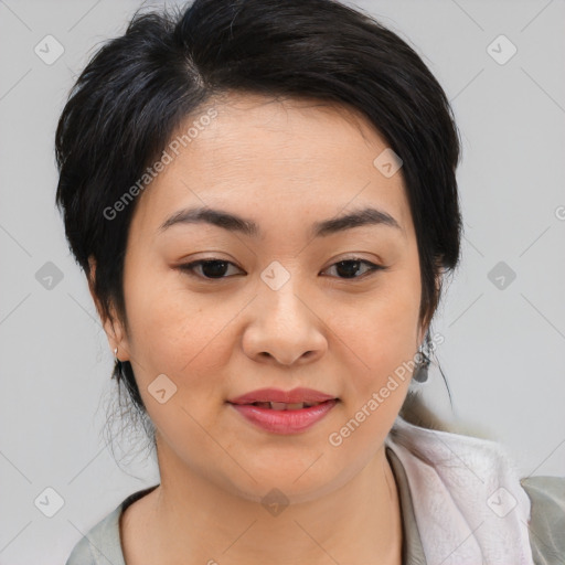 Joyful asian young-adult female with medium  black hair and brown eyes