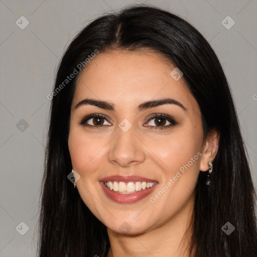 Joyful white young-adult female with long  black hair and brown eyes