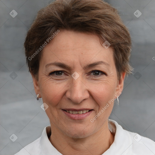 Joyful white adult female with short  brown hair and brown eyes