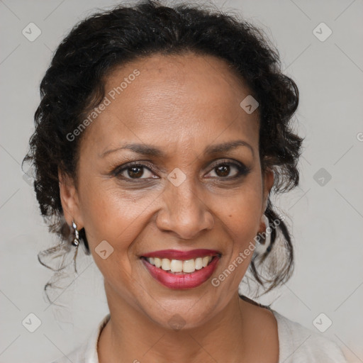 Joyful black adult female with medium  brown hair and brown eyes