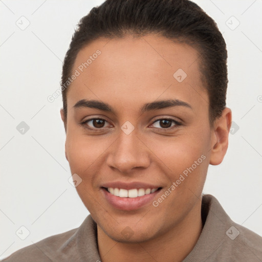 Joyful white young-adult female with short  brown hair and brown eyes