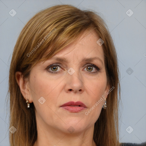 Joyful white adult female with long  brown hair and brown eyes