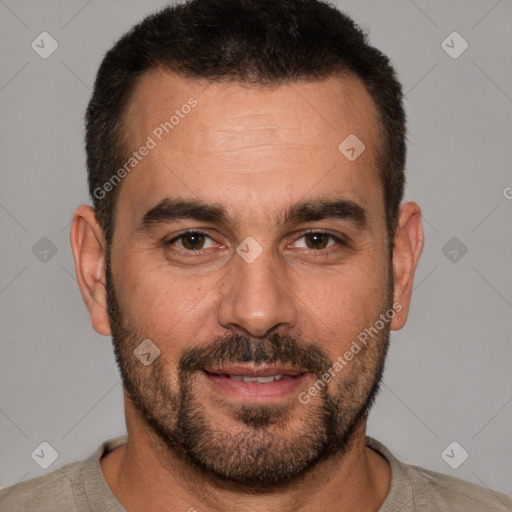 Joyful white adult male with short  brown hair and brown eyes