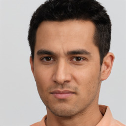 Neutral white young-adult male with short  black hair and brown eyes