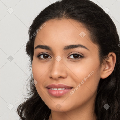 Joyful latino young-adult female with long  brown hair and brown eyes