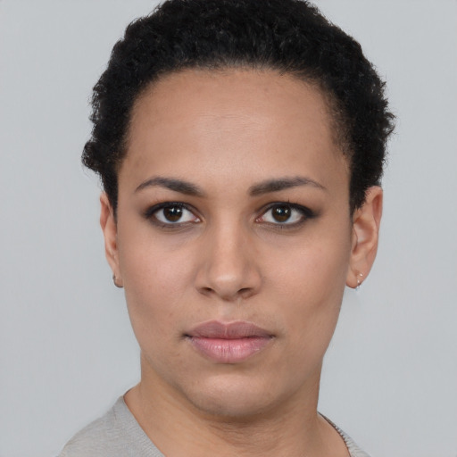 Neutral black young-adult female with short  black hair and brown eyes