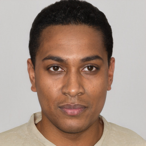 Neutral black young-adult male with short  black hair and brown eyes