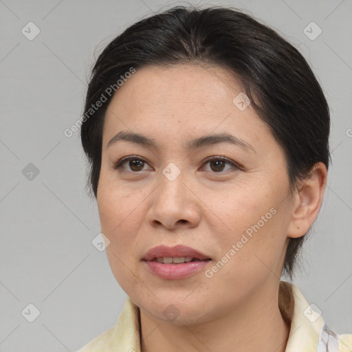 Joyful white adult female with medium  brown hair and brown eyes