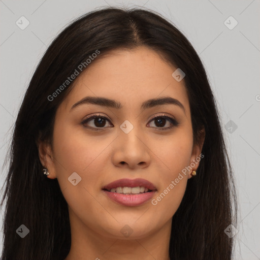 Joyful latino young-adult female with long  brown hair and brown eyes