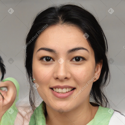 Joyful asian young-adult female with medium  brown hair and brown eyes