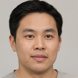 Neutral asian young-adult male with short  black hair and brown eyes