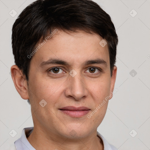 Joyful white adult male with short  brown hair and brown eyes