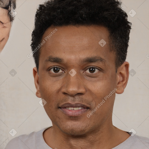 Neutral black young-adult male with short  black hair and brown eyes