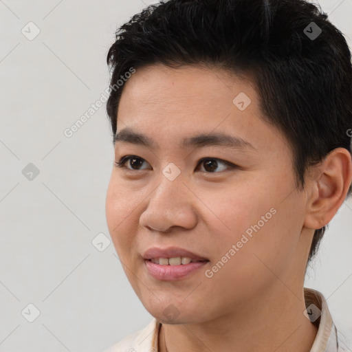 Joyful asian young-adult male with short  black hair and brown eyes