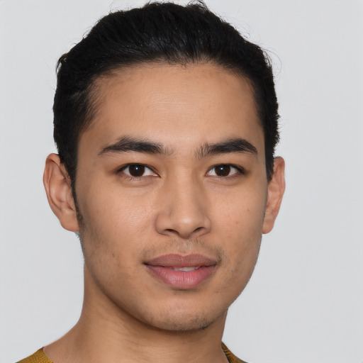 Joyful asian young-adult male with short  brown hair and brown eyes