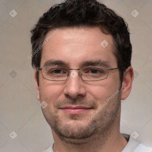 Joyful white adult male with short  brown hair and brown eyes