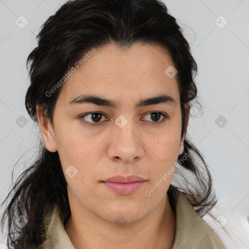 Joyful latino young-adult female with medium  brown hair and brown eyes