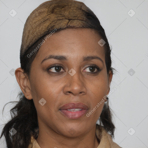 Joyful black adult female with short  brown hair and brown eyes