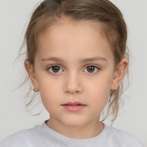 Neutral white child female with medium  brown hair and brown eyes