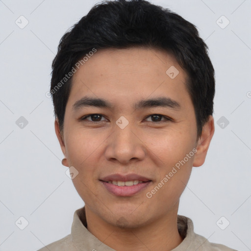 Joyful asian young-adult male with short  black hair and brown eyes