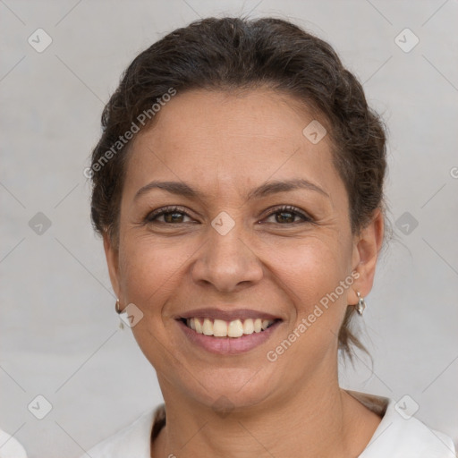 Joyful white adult female with short  brown hair and brown eyes