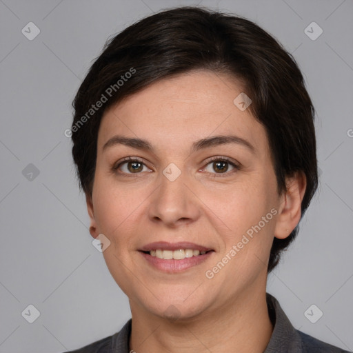 Joyful white adult female with medium  brown hair and brown eyes