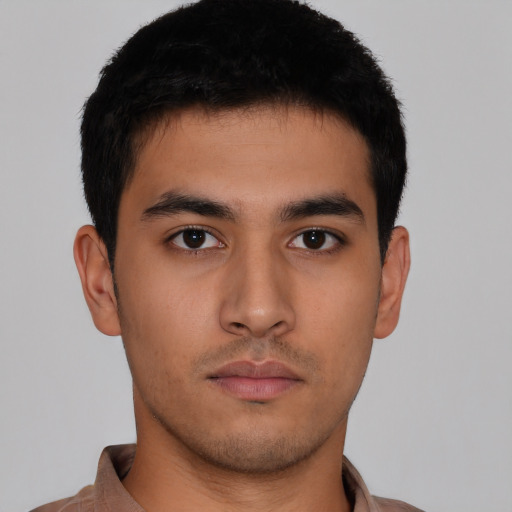 Neutral asian young-adult male with short  brown hair and brown eyes