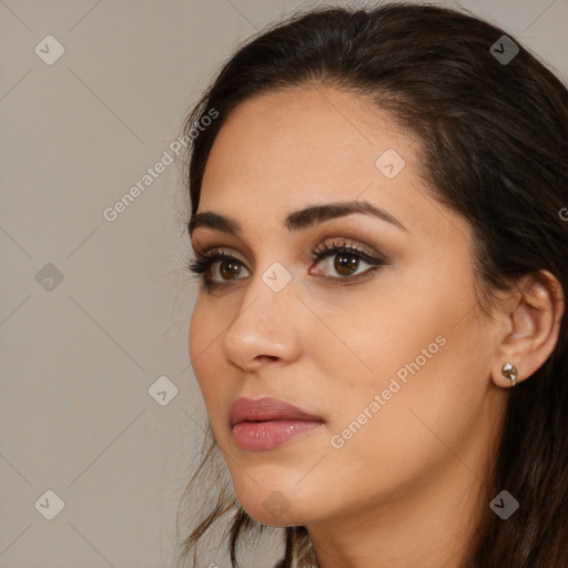 Neutral white young-adult female with long  brown hair and brown eyes